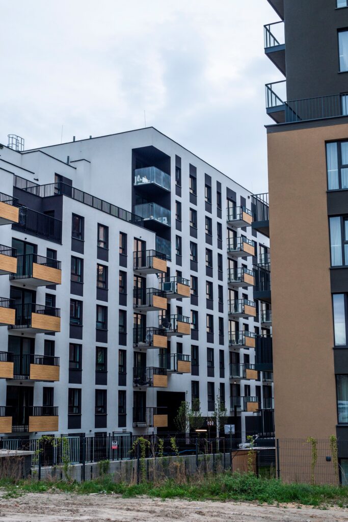 Contemporary apartment blocks showcasing modern architectural design in urban setting.